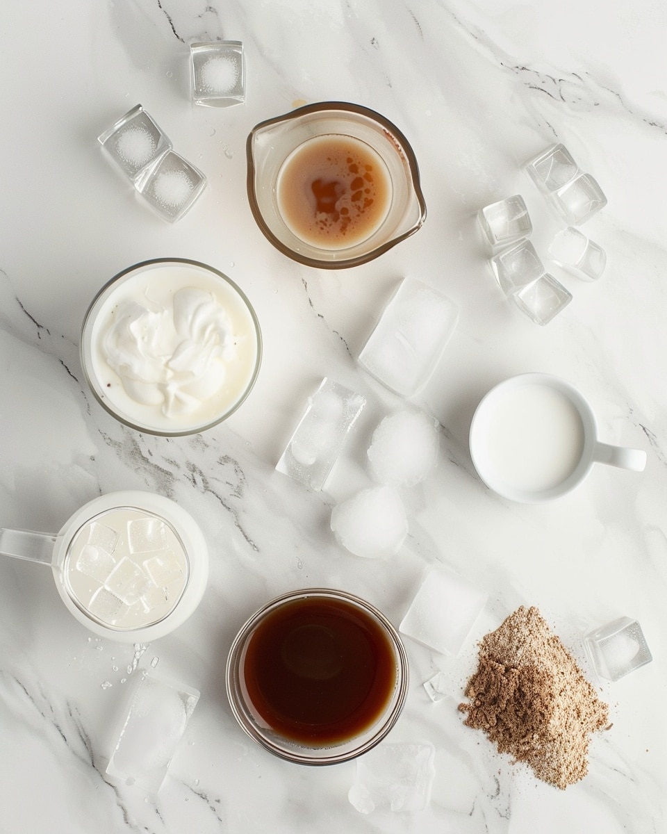 Single white glass filled with one serving of iced cherry latte, showcasing a layered gradient of deep cherry syrup at the bottom, creamy coffee in the middle, and topped with thick, frothy pink cherry foam, close-up angled view highlighting the contrast and texture of each layer, placed on a white marble surface with bright natural light, styled as a ready-to-drink portion, photo taken with an iphone --ar 4:5 --v 7
