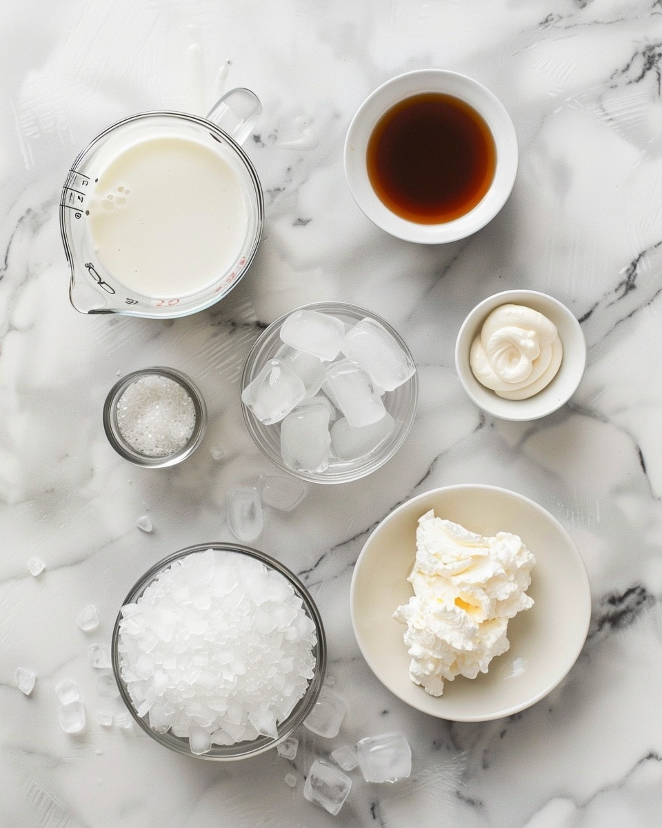 A single white glass mug filled with a creamy, pastel pink rose-flavored milk drink topped with a delicate sprinkle of crushed rose petals, showing the smooth texture and gentle froth at the surface, small rose petals scattered inside and around the rim, placed on a white marble surface with natural light highlighting the softness and romantic hues, intimate close-up view of one plated serving photo taken with an iphone --ar 4:5 --v 7